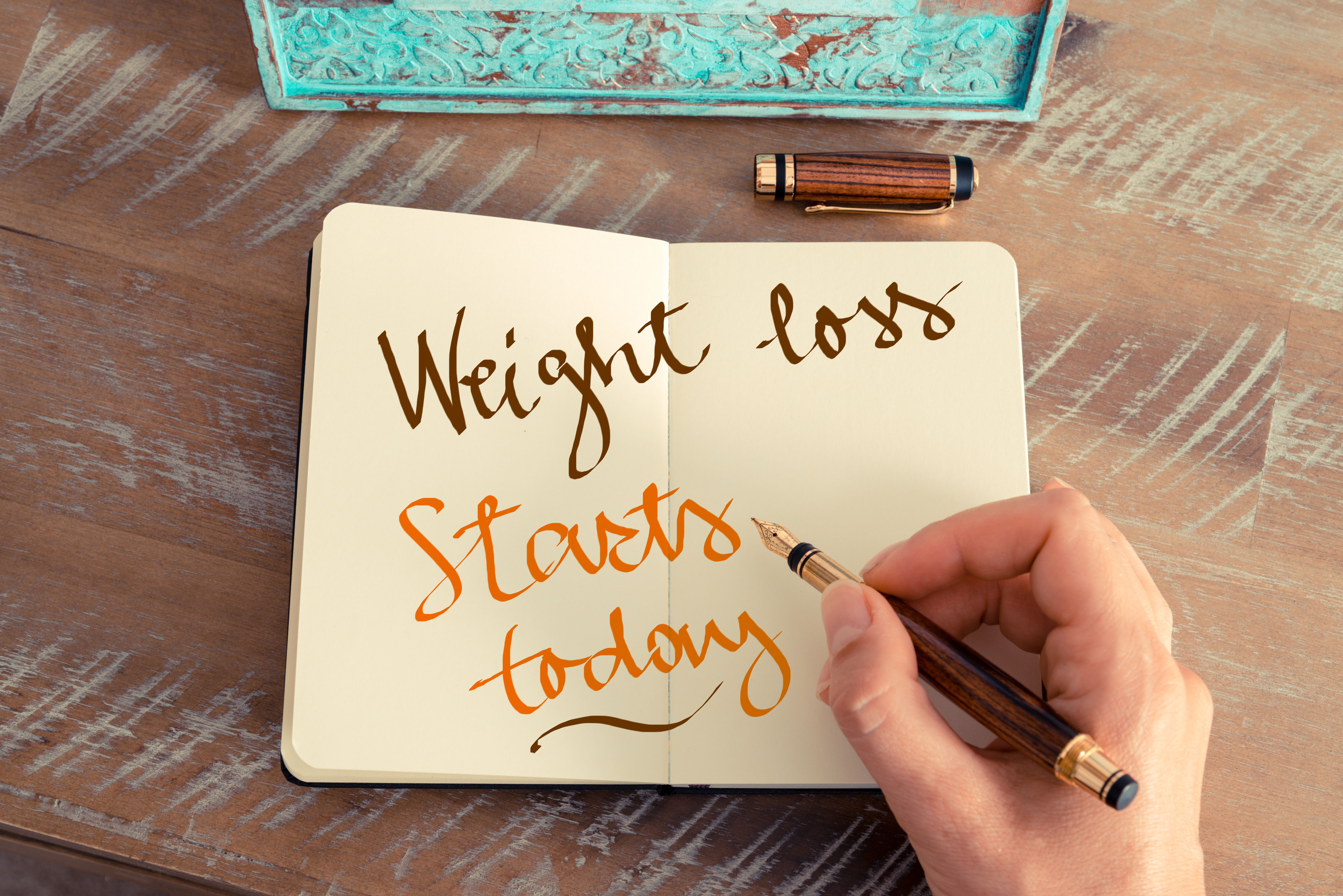 Weight loss starts today written in diary