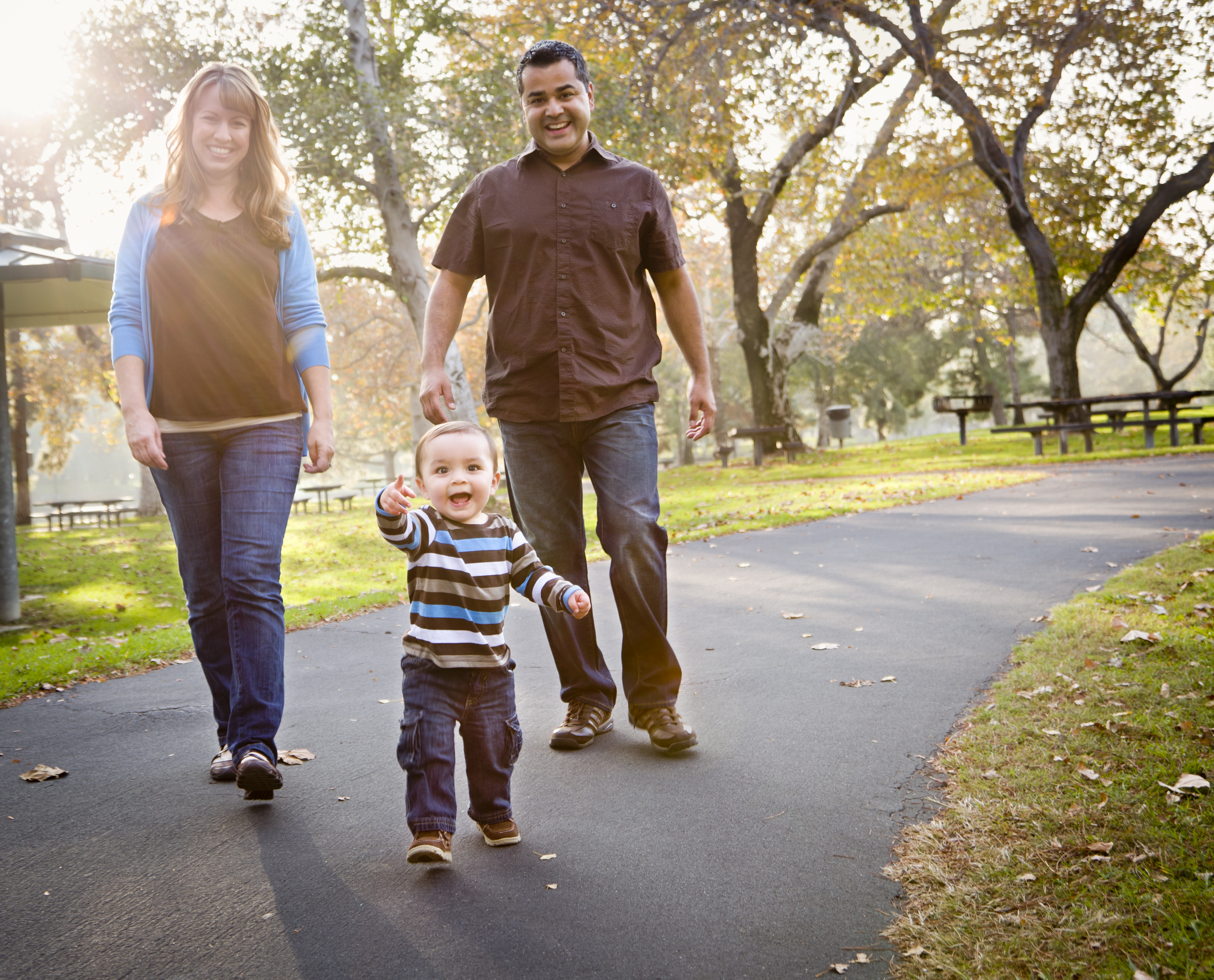 Couple walking with child
