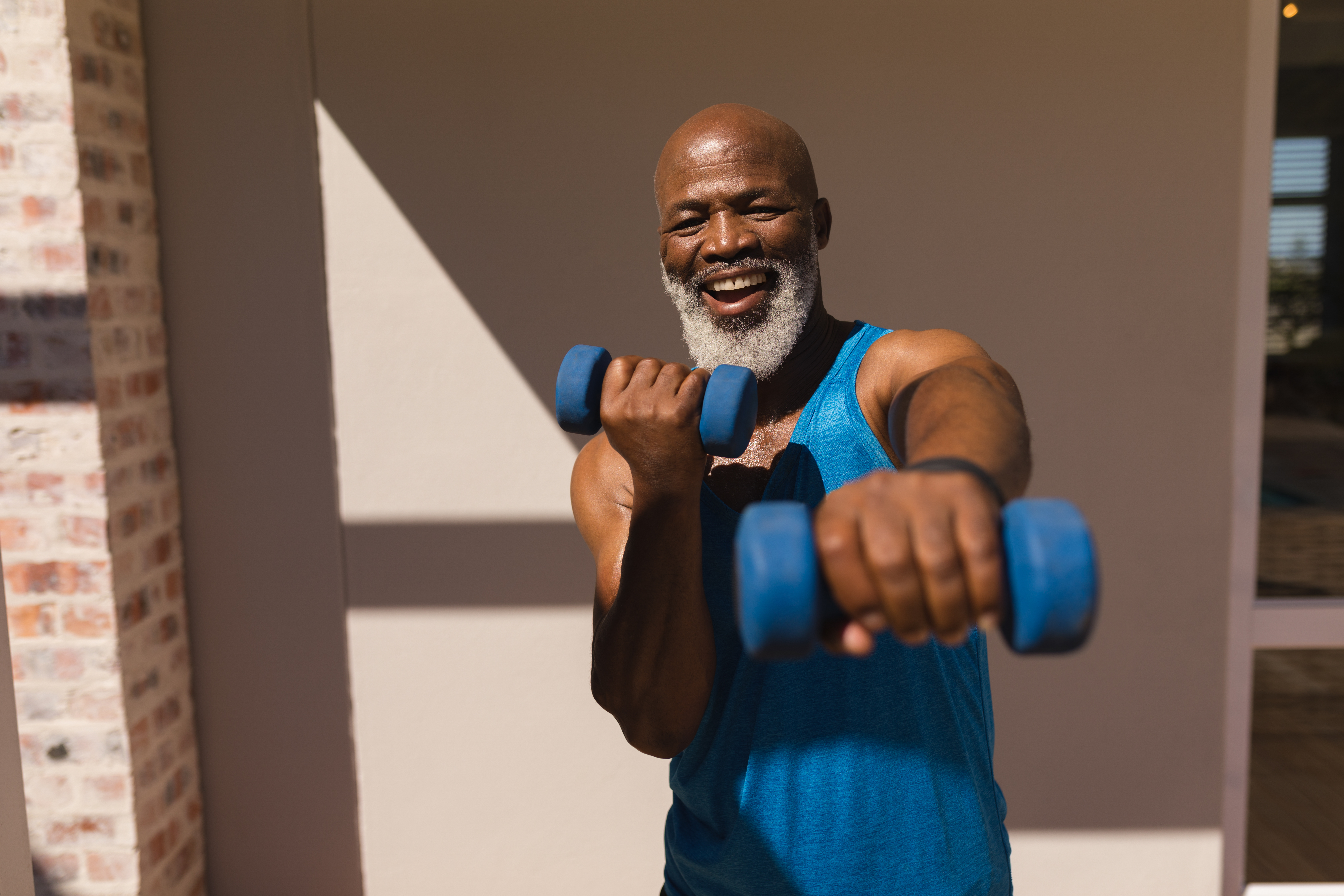Man exercising with hand weights