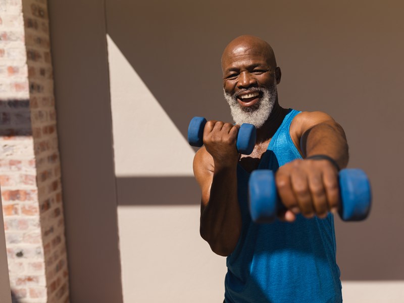 Man exercising with hand weights
