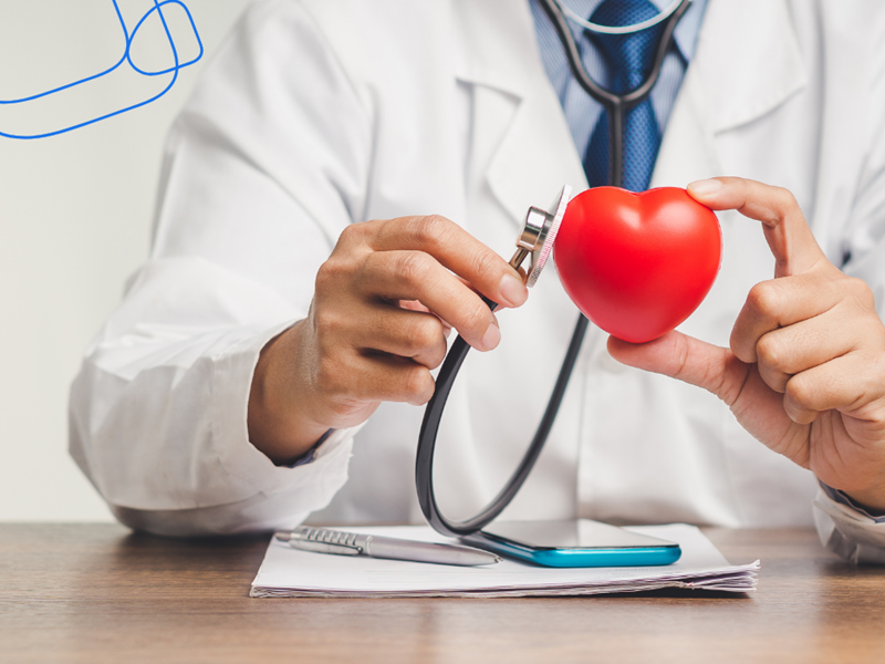 Doctor holding heart