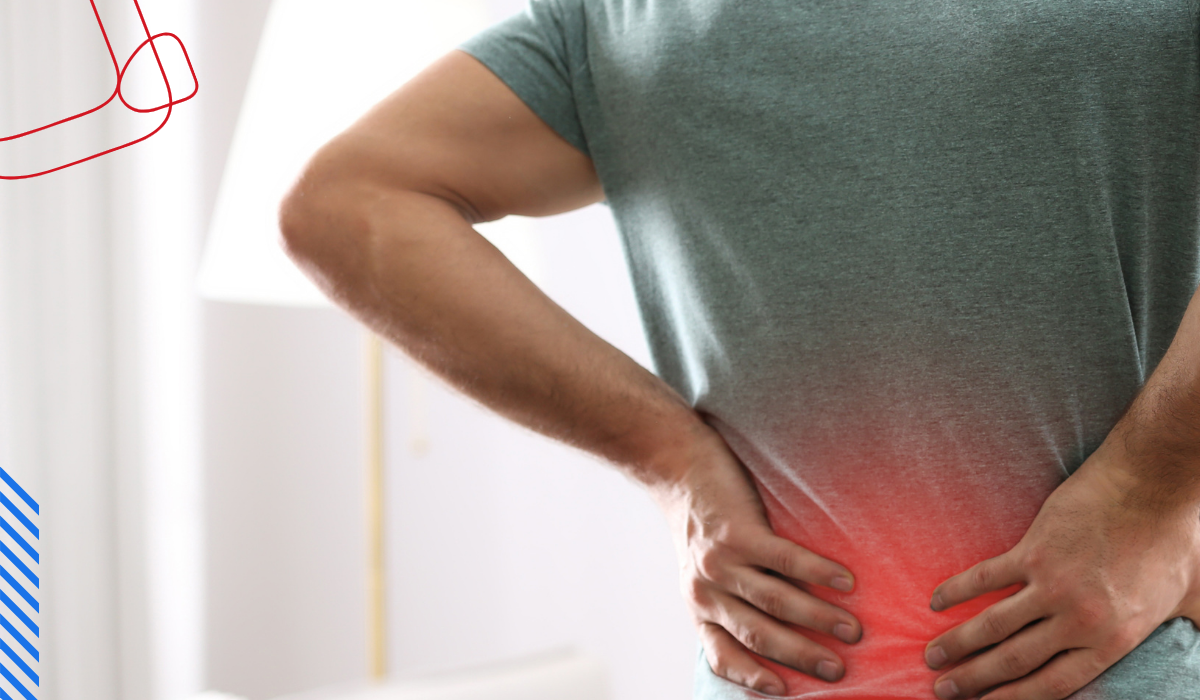 Person holding their back